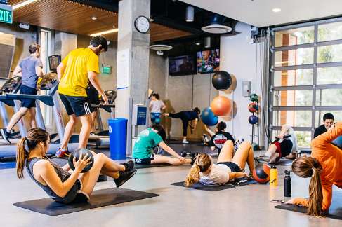 Many students workout in a fitness center