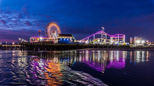 Santa Monica Pier is decorated in neon lights