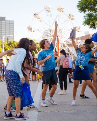 Students dance and sing at the Westwood Block Party
